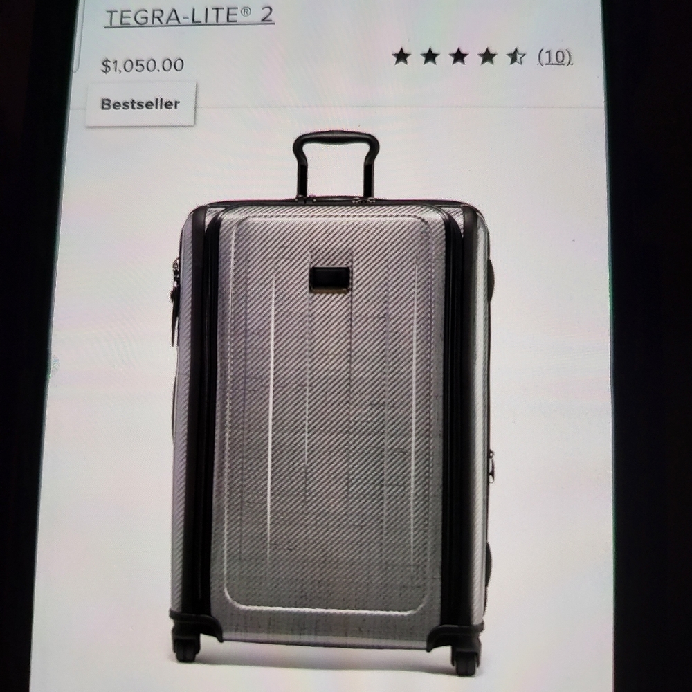 NEW TUMI LARGE LUGGAGE